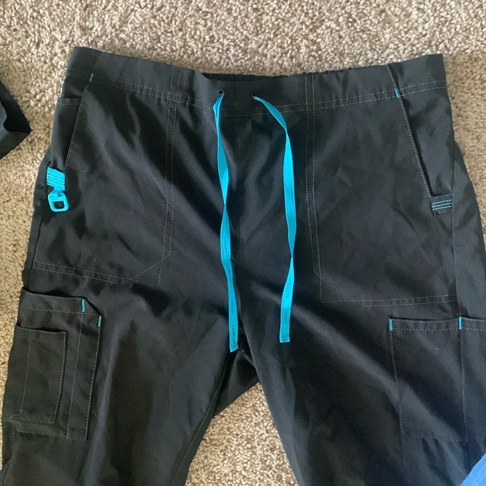 Black Carhartt scrub pants